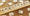 Arbitrage spelled out in wooden tiles