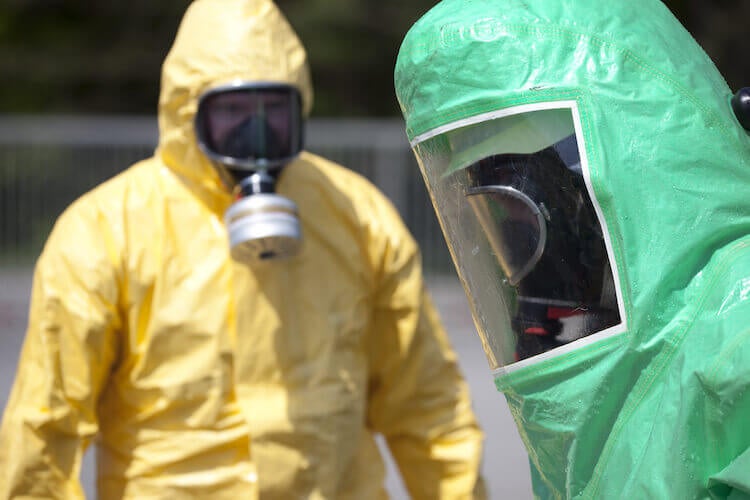 Coronavirus: People in hazmat suits