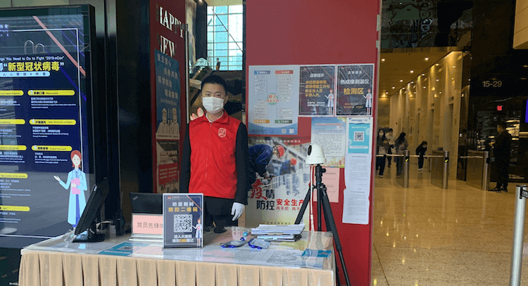 Living in China with Coronavirus: health check at building entrance