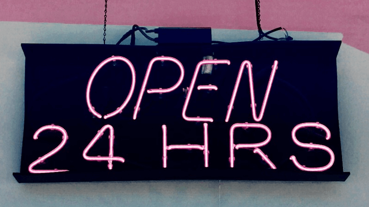 Amazon brick and mortar stores: 24 hour sign on the side of a building (@TonyTheTigersSon via Twenty20)