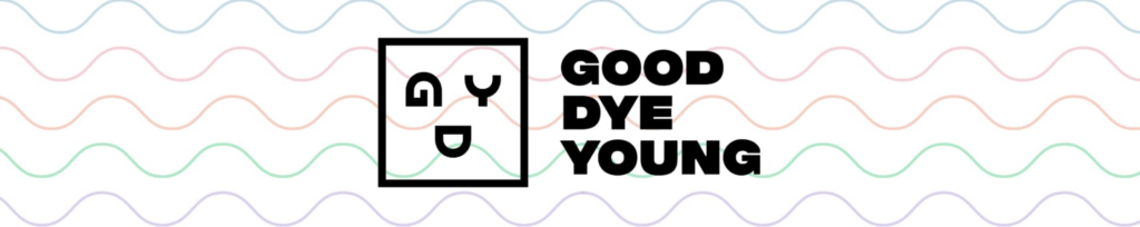 A banner image featuring the logo of the brand Good Dye Young. The background of the image has a series of wavy lines in various bright colors, including blue, pink, orange, green, and purple. The logo is a black square with black letters inside that read "GDY". The image also has black text that reads "Good Dye Young" in bold font.