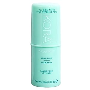 An image of a tube of Kora Organics brand face balm. The tube is mint green against a white background.